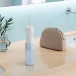 Panasonic Water Flosser for Travel, Cordless Portable Oral Irrigator with Two Water Pressure Settings, Collapsible Water Tank - EW-DJ11​-A